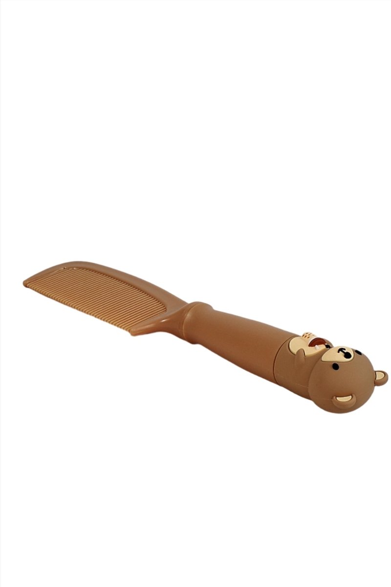 Tan kids comb with bear design on handle and wide comb teeth
