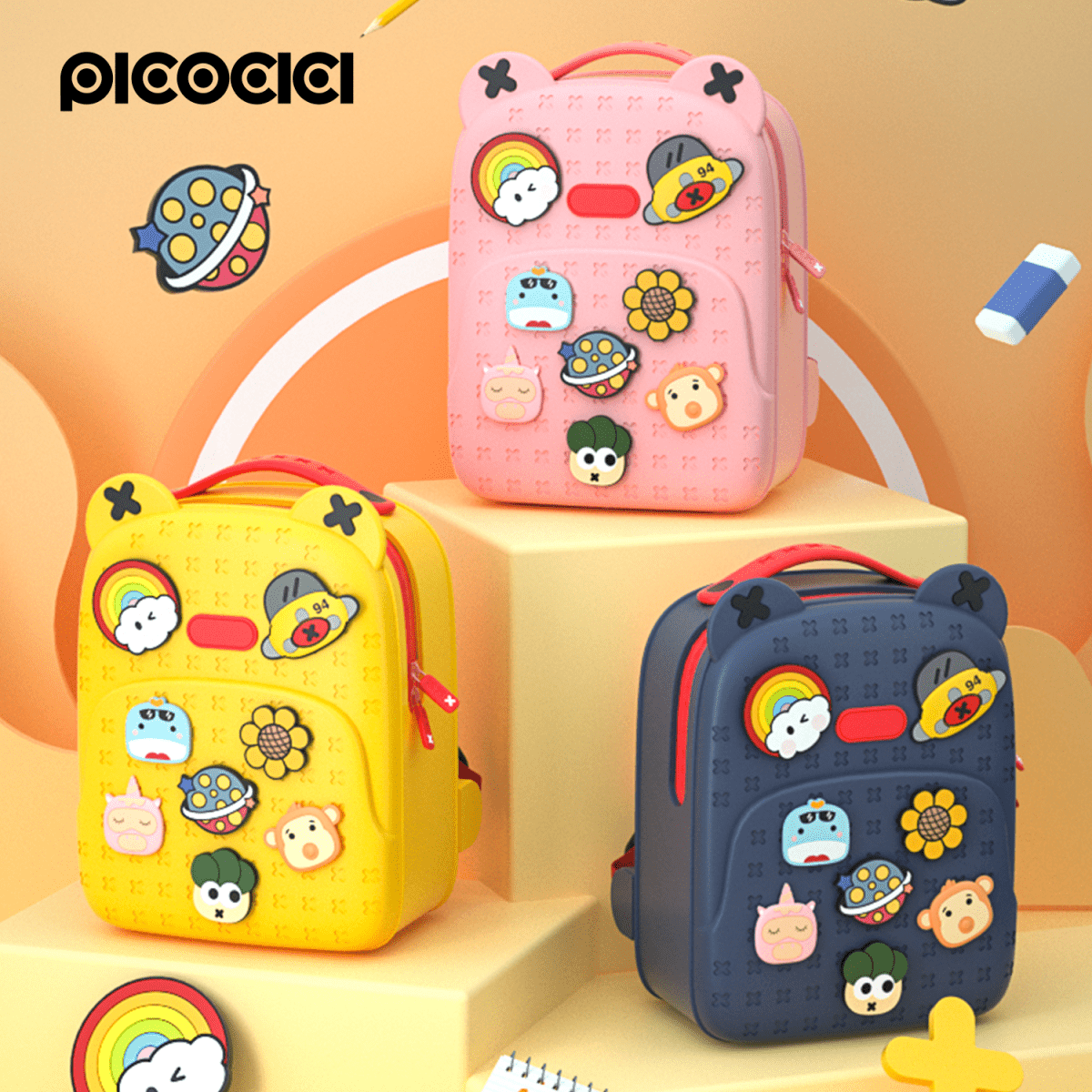 Set of kids silicone backpacks: pink, yellow, and navy, each with cute animal patch icons