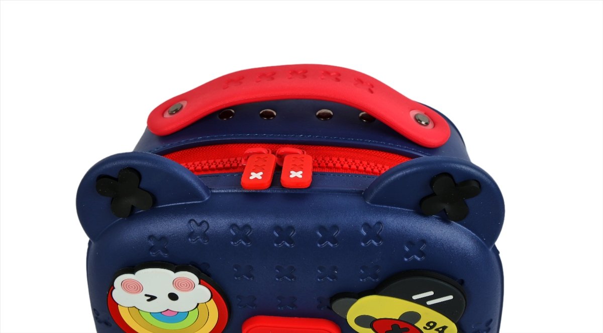 Navy kids silicone backpack top close-up with bear-ear handles and red trim zipper