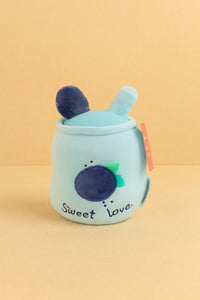 Light-blue plush blueberry toy with dark berry cap, green leaf, 'Sweet love' front