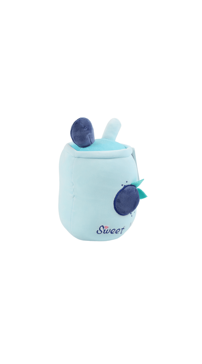 Light-blue plush blueberry toy side view with dark berry patch, green leaf, top tuft