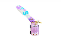 Purple keychain with gold ring, toy car charm, and “Sweet” lanyard strap