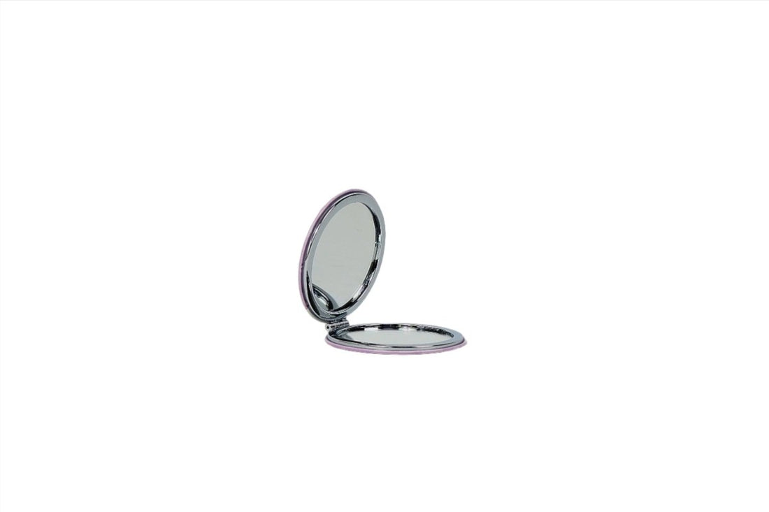 Compact mirror with open circular silver case and reflective round mirror.