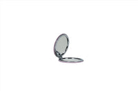Compact mirror with open circular silver case and reflective round mirror.