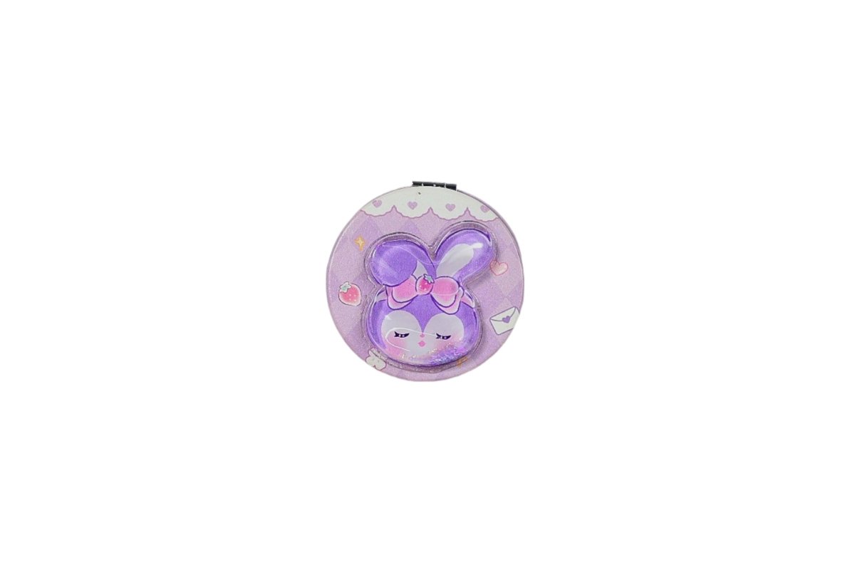 Round compact mirror with purple bunny illustration on the closed lid.