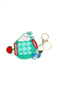Bunny dessert silicone pop keychain, turquoise teal with DESSERT text and heart charm