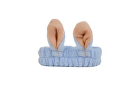 Light blue plush rabbit-knot hair band with pink bunny ears