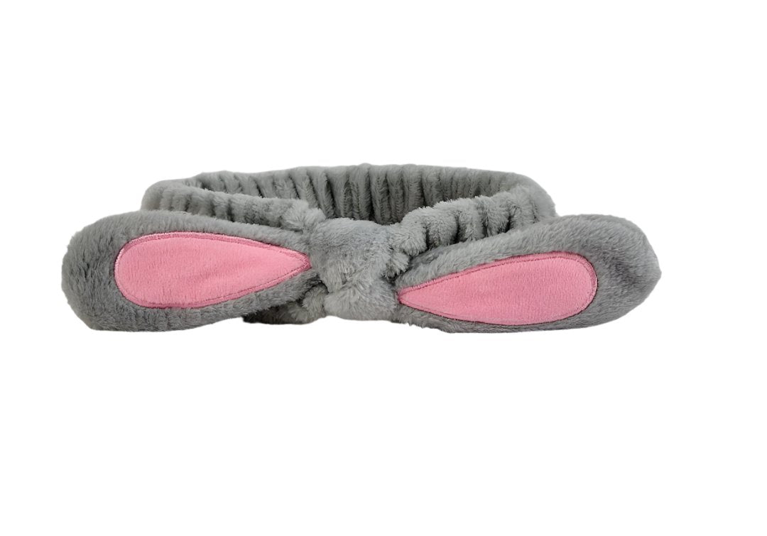 Gray plush rabbit-knot hair band with pink-lined ear pads