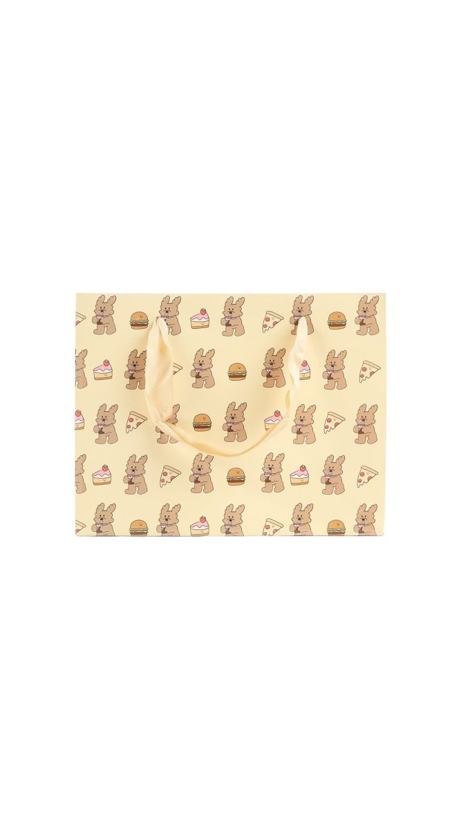Tan bunny gift bag with repeating bunny icons and rope handle