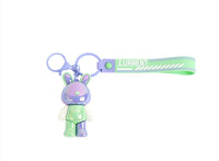 Bunny keychain with blue strap and purple rabbit charm, with key ring.