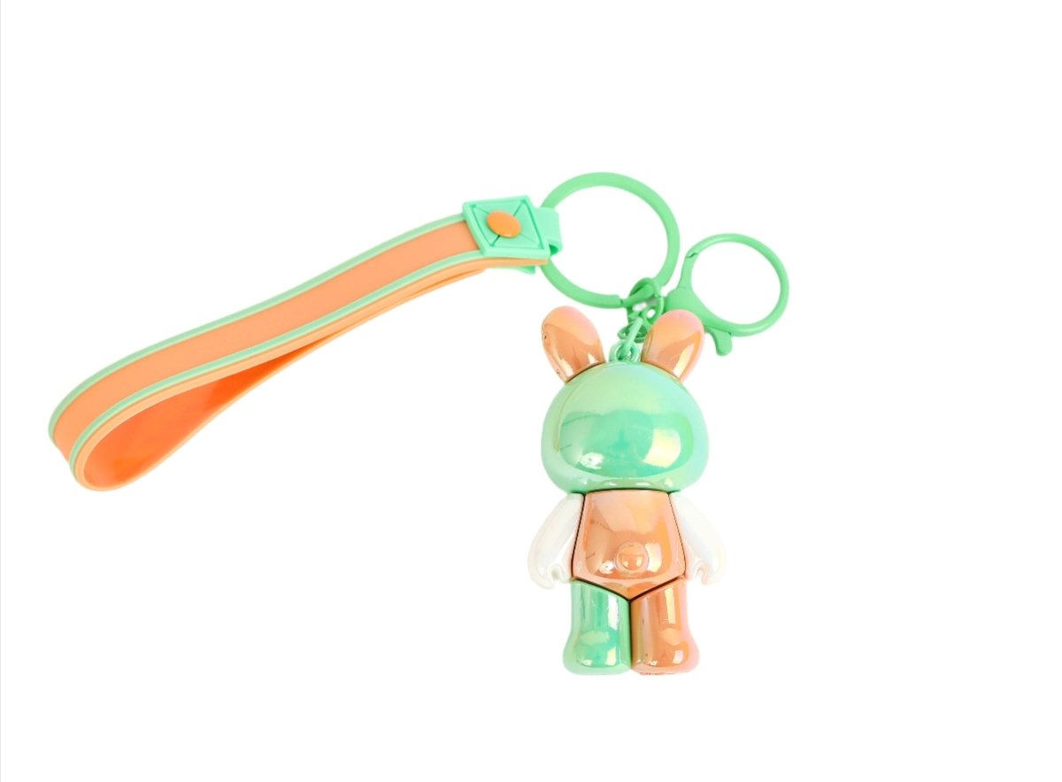 Bunny keychain with orange-and-green strap and orange rabbit charm, with ring.