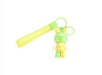 Bunny keychain with neon green strap and green rabbit charm, with key ring.