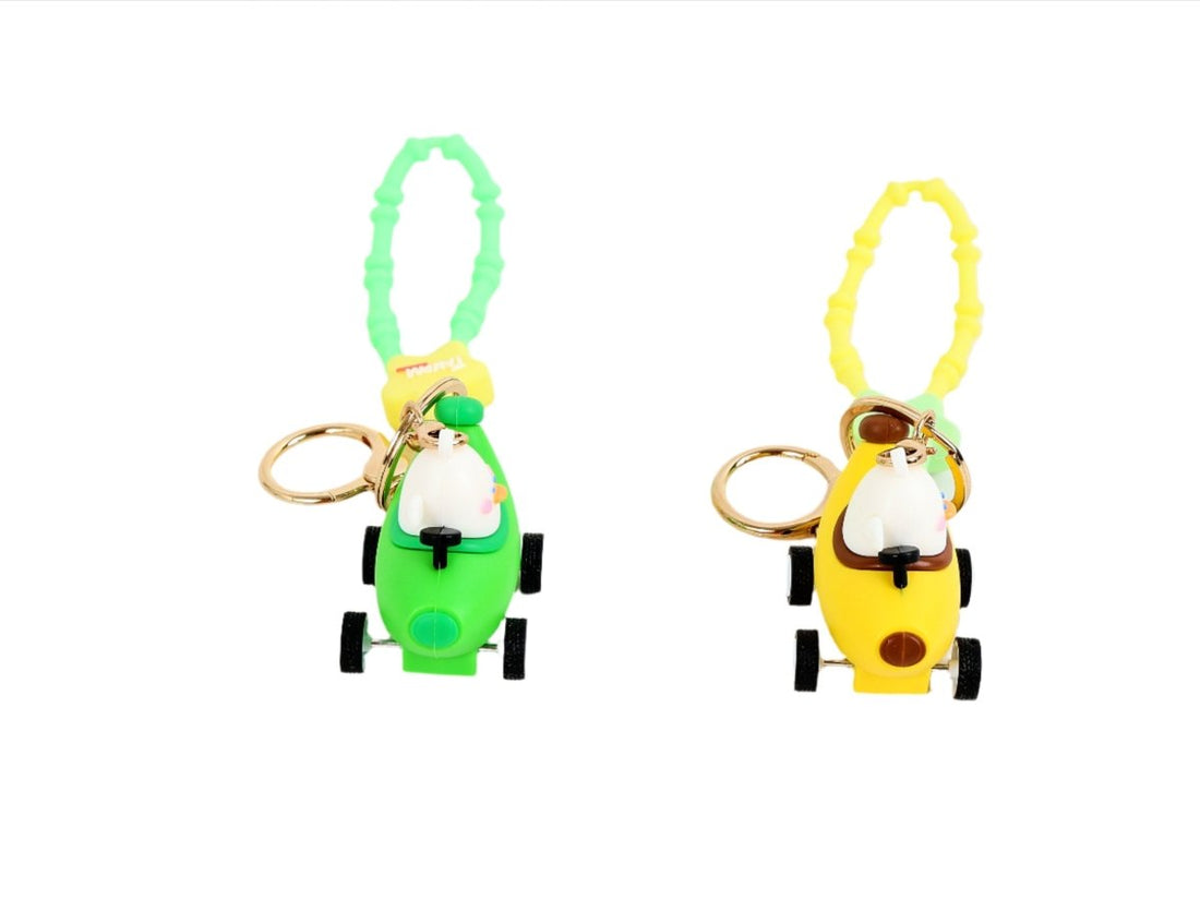 Cartoon car keychains with banana-shaped lanyard, green and yellow fronts.