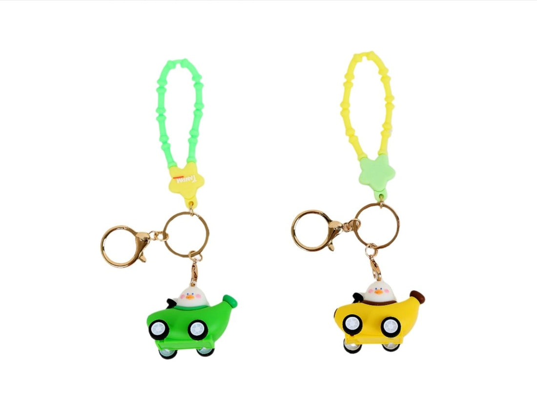 Car keychains with banana-shaped lanyard, green and yellow cartoon cars.