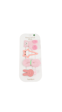 Children's hair accessory set in pink and coral tones