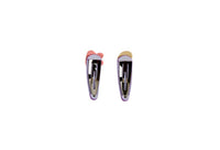 Pair of kids hair clips in purple with pink and beige ends