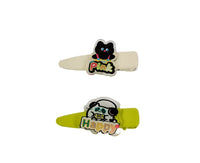 Animal-themed hair clips with Pink and Happy patches, beige and green pair