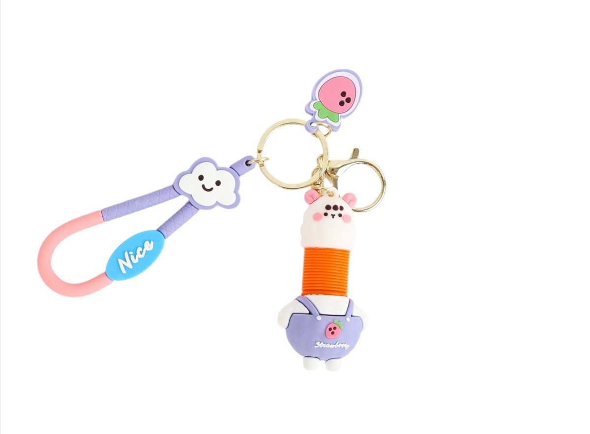 Rabbit cartoon keychain with lavender bunny, blue Ncy tag, orange spool charm and pink handle