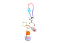 Rabbit cartoon keychain with pink loop, blue tag, orange spiral and hanging pig charm