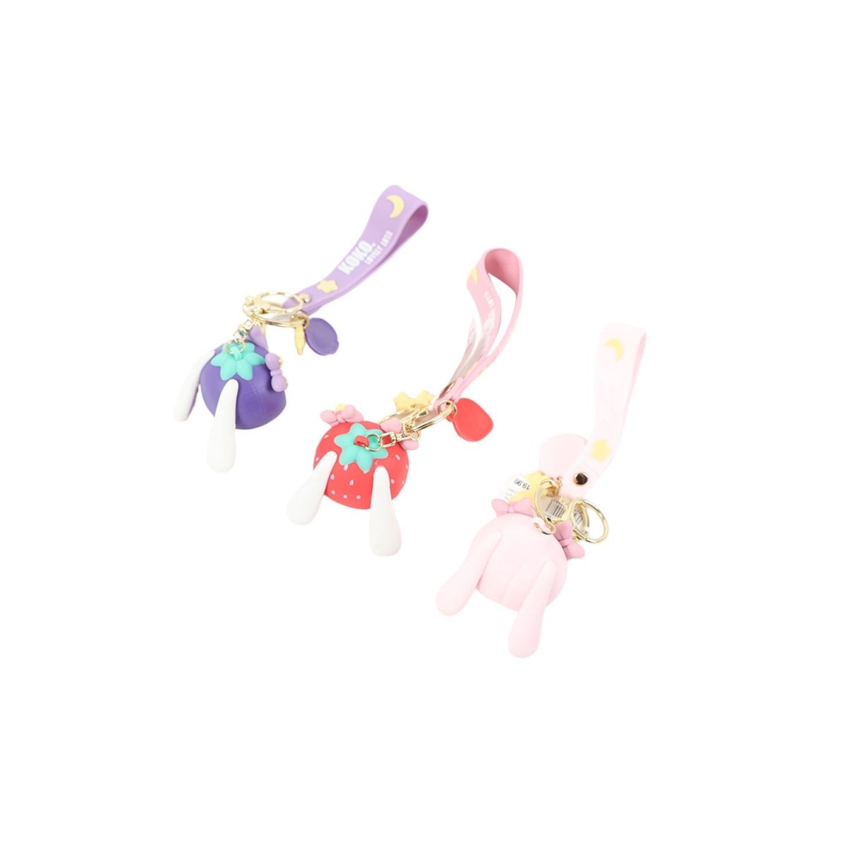 Cartoon fruit keychains with straps, pink plush characters with dangling charms and rings.