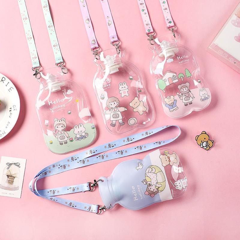 Transparent hot water bottles with cartoon character designs and long straps