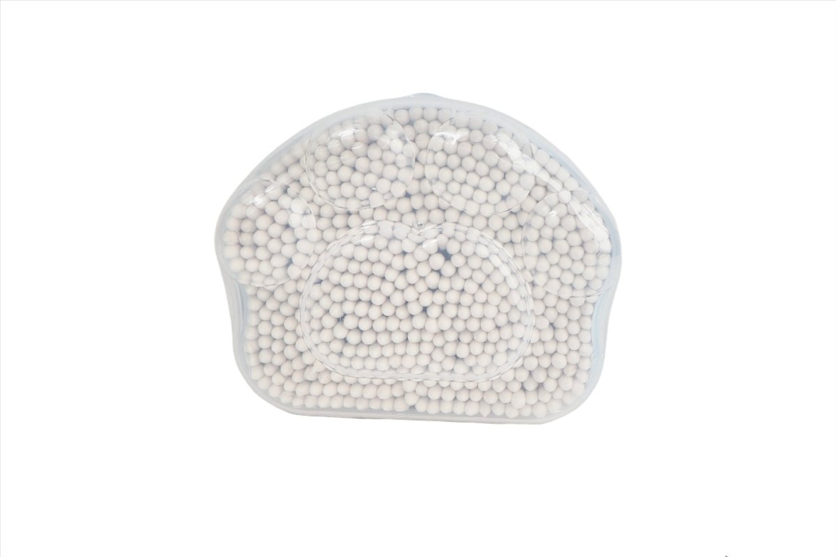 White cotton swabs in clear oval tray