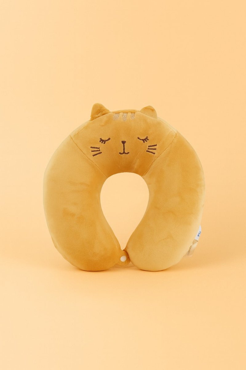 Cat-shaped travel neck pillow, plush tan with cartoon face on front