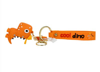 Orange PVC dinosaur keychain with cool dino wrist strap and dino figure charm
