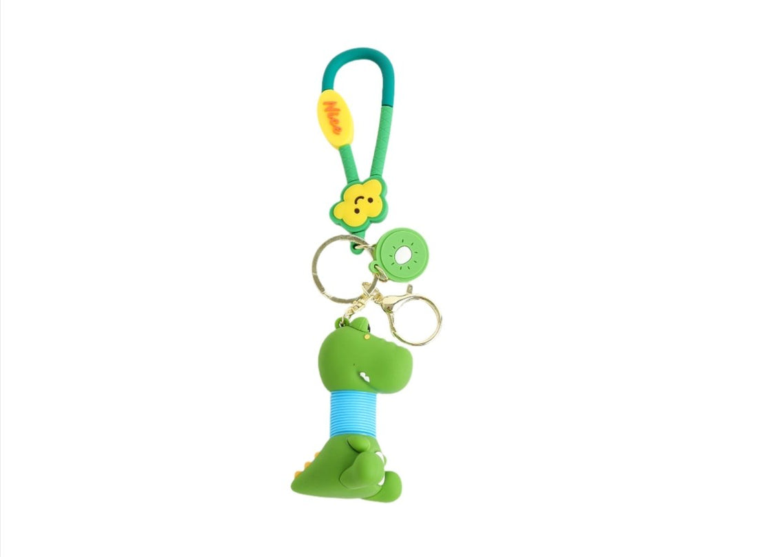 Green dinosaur keychain with teal loop strap and small round key ring clip