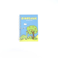 Dinosaur A6 coil notebook, blue cover with green tree, dinosaur, and small plants.