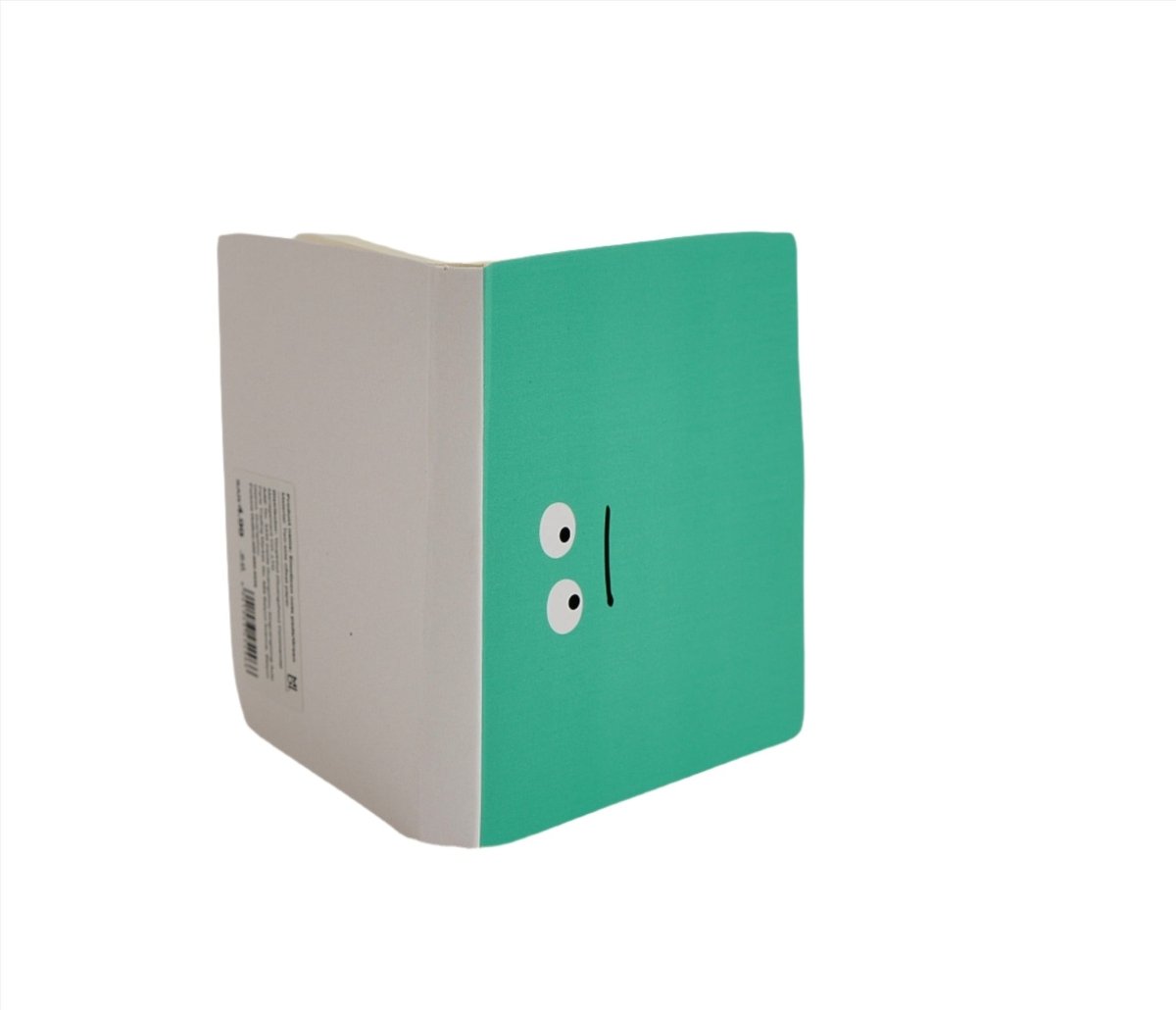 Green notebook with cute face graphic, shown from side with white spine