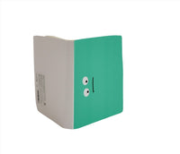 Green notebook with cute face graphic, shown from side with white spine