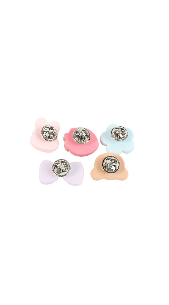 Five pastel animal hair pins with round metal center details