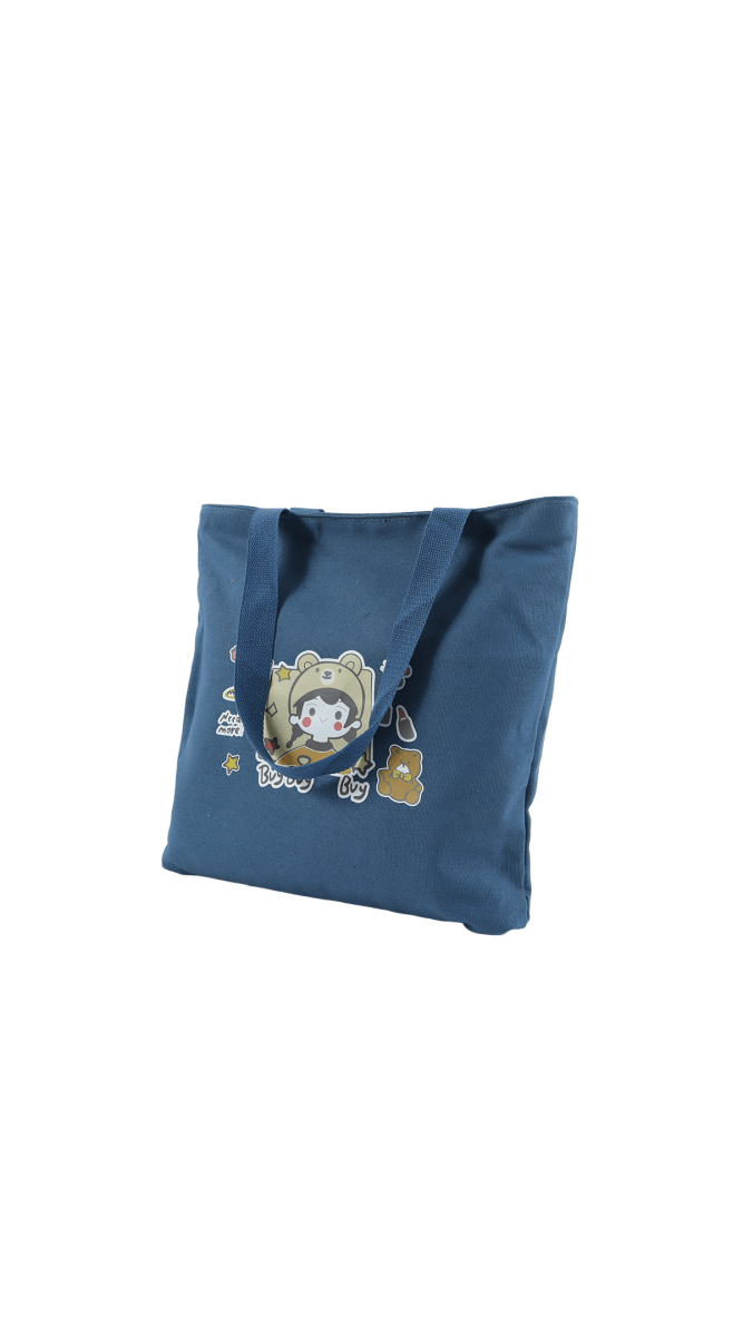 Blue kids canvas tote bag with cartoon bear graphic and small star accents