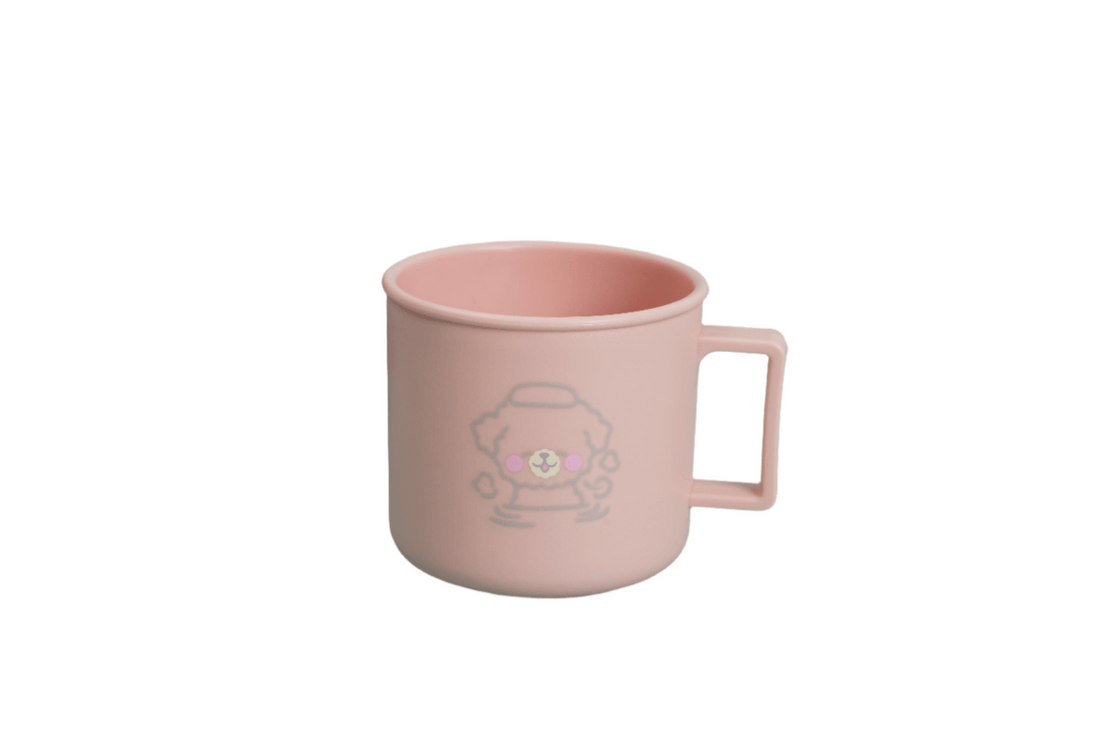Pink kids' cartoon mug with bear and flower graphic, side handle