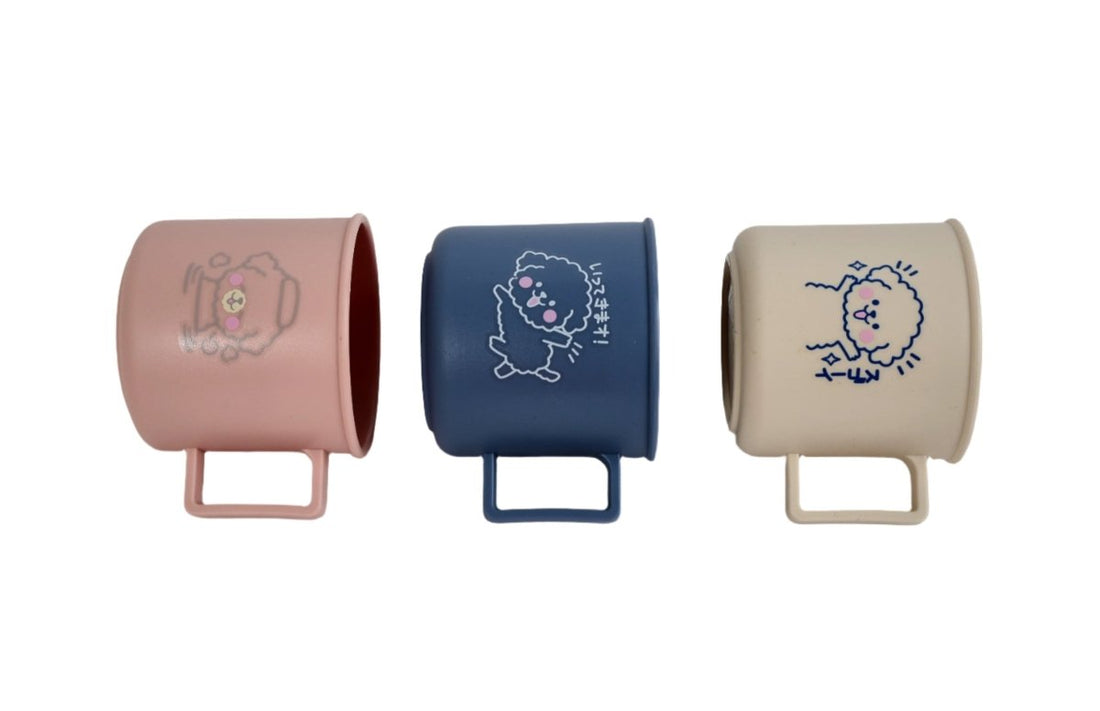 Kids' cartoon mugs: pink, blue, and off-white with cute character prints and handles