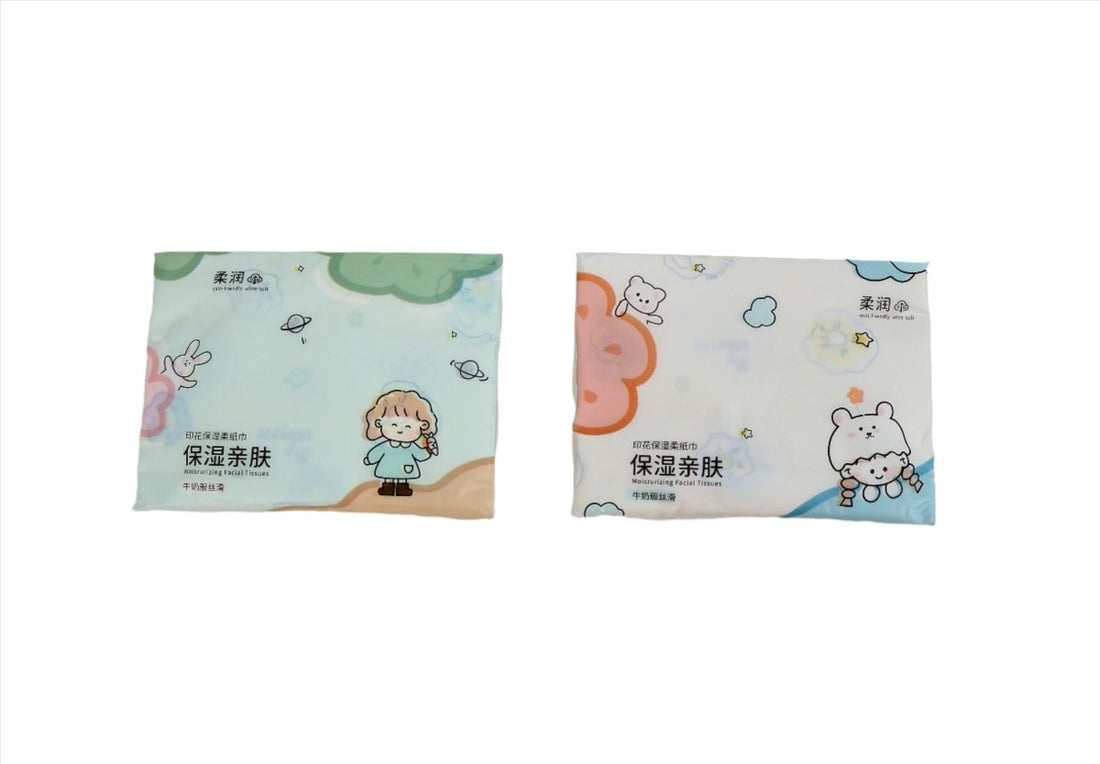Kids moisturizing facial tissues in two packets, pastel blue and pale green with characters
