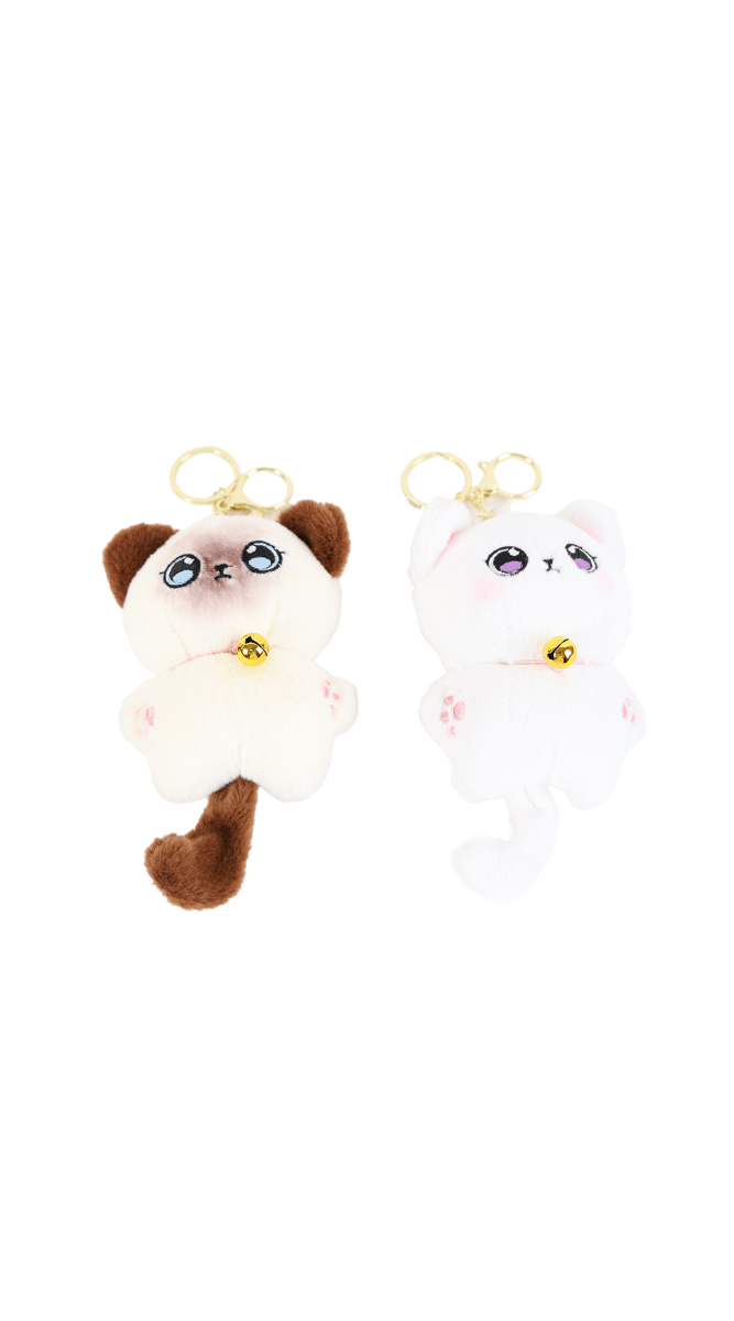 Plush bell cat keychains in brown and pink, with gold bell and key ring loops