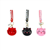 Cat coin purse keychain trio in red, black, and pink with lanyards