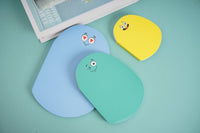 Worm-shaped notebooks with light blue, teal, and yellow covers and small cartoon eyes