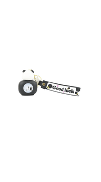Panda keychain with panda head charm, gold ring, black strap reading 'Good luck'.