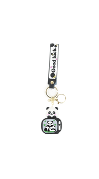 Panda keychain with backpack charm, gold ring, black strap reading 'Good luck'.