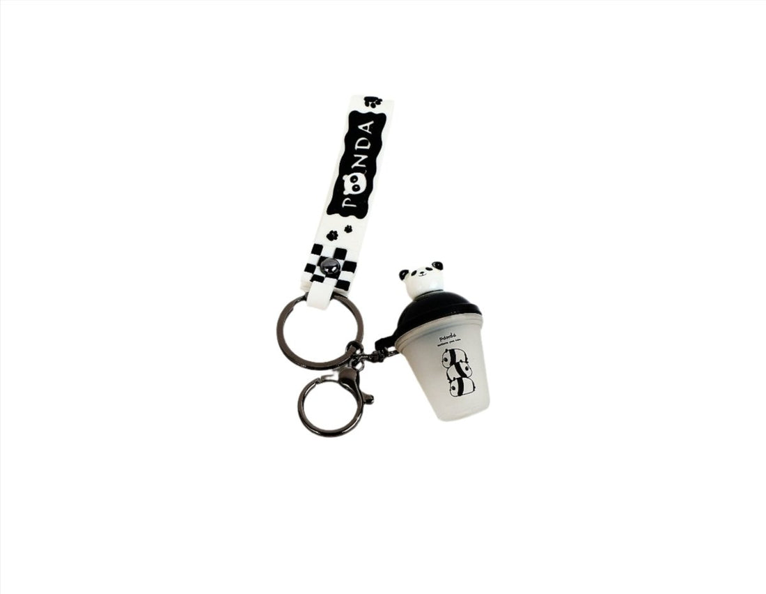 Panda keychain with white ribbon strap, two rings, and panda-face container