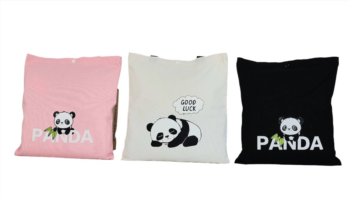 Set of three canvas tote bags in pink, white, and black, each with panda graphic