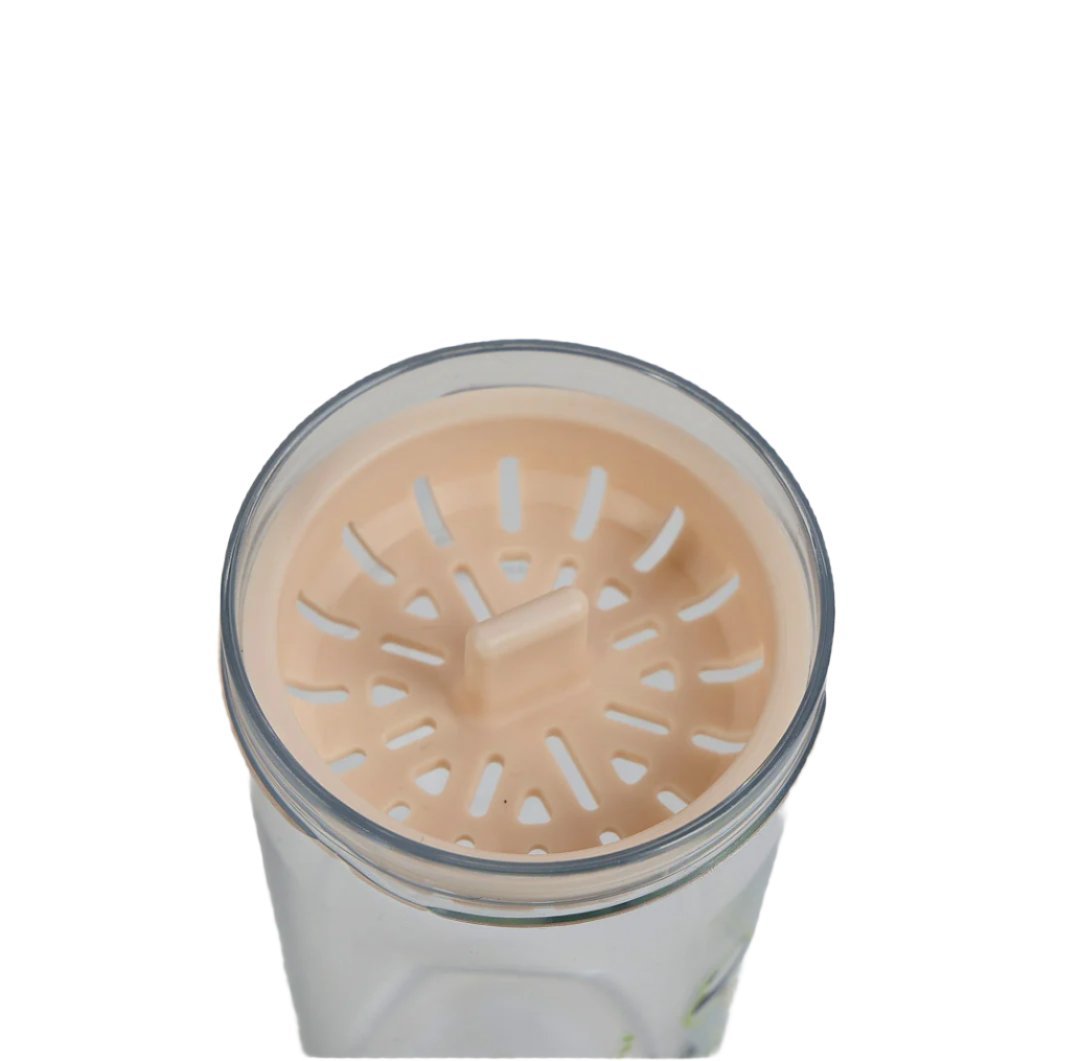 Plastic water bottle lid with beige sunburst drinking strainer insert