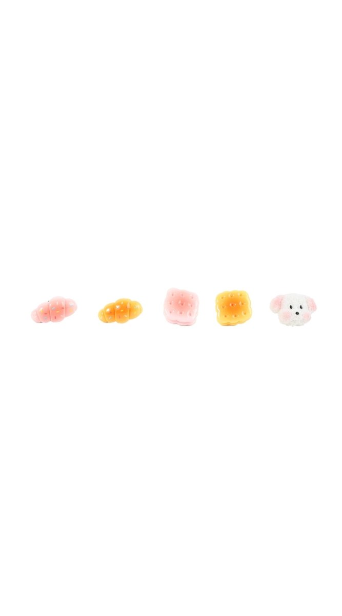 Six small pastel pastry and dog pins, scattered display