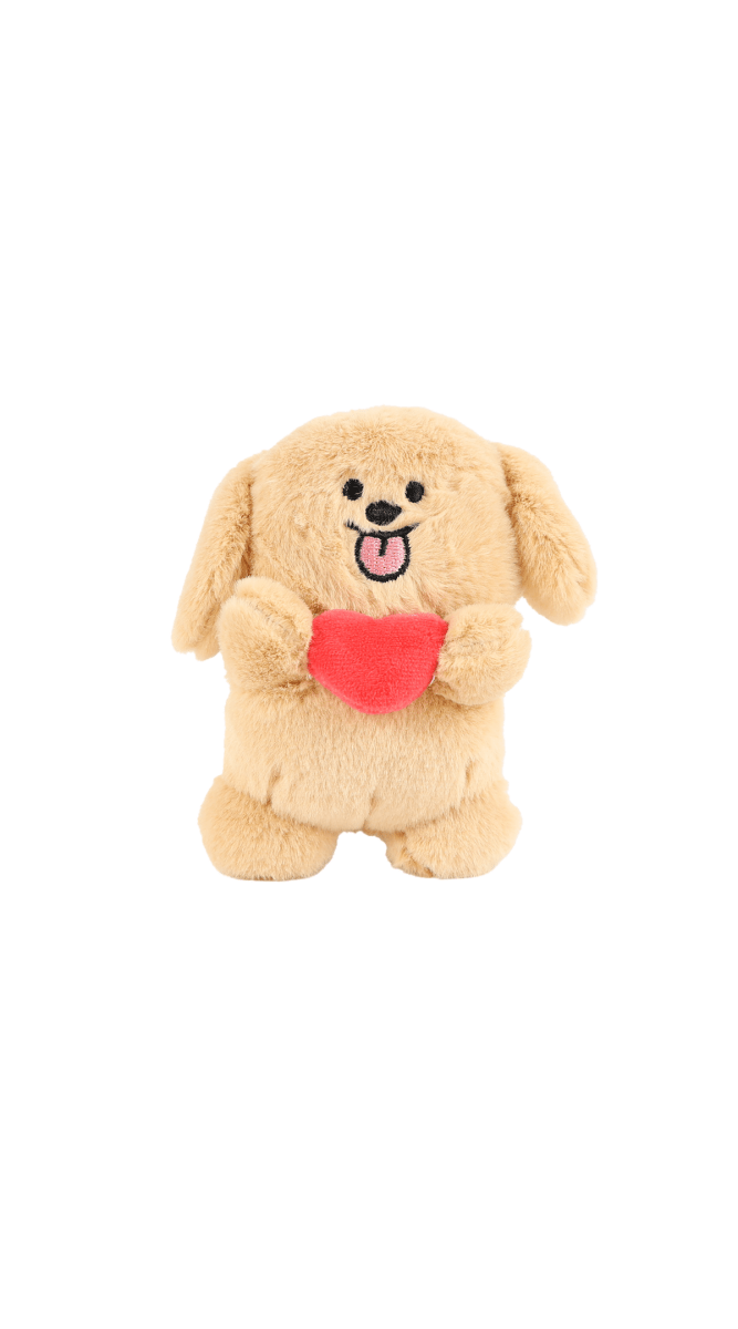 Tan plush dog keychain with smiling face and red heart on chest