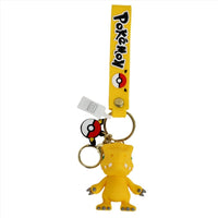 PVC keychain with a yellow creature character and metal key ring on a yellow strap