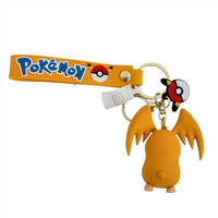 PVC keychain with an orange creature figure on a lanyard and metal key ring