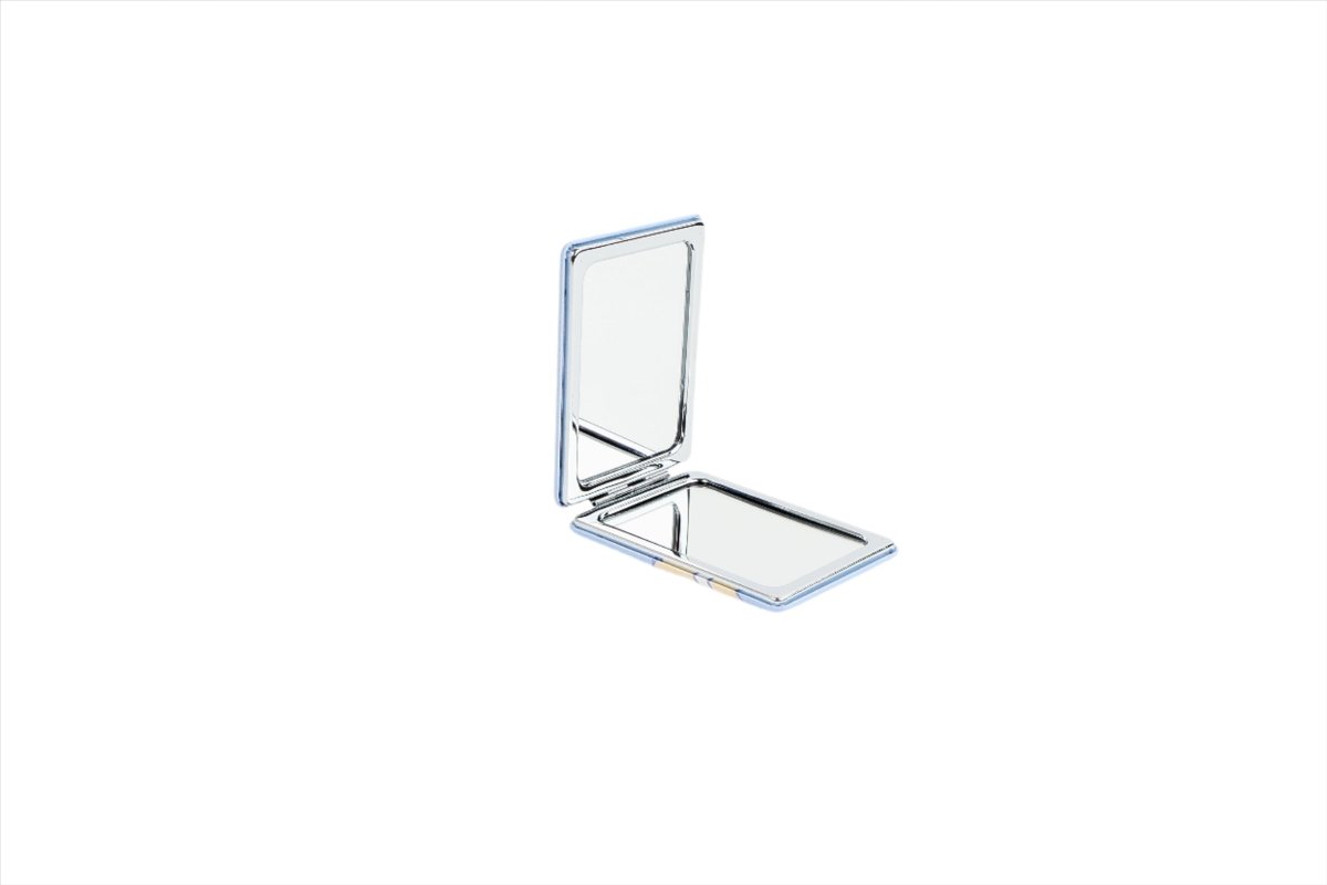 Compact mirror open with silver frame and glass visible